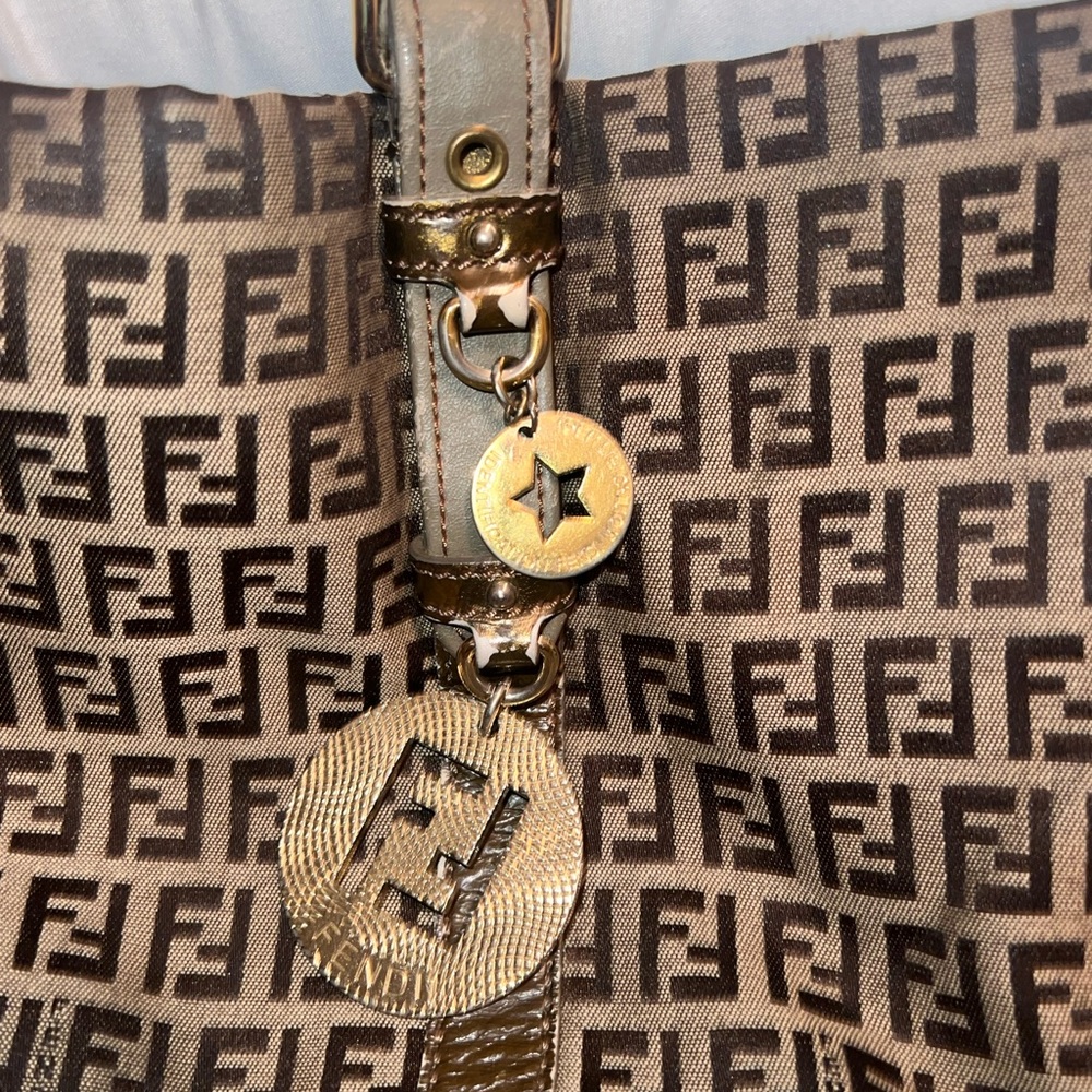 FENDI MONO TOTE. Corner of the bag is a little worn. Straps are slightly faded.